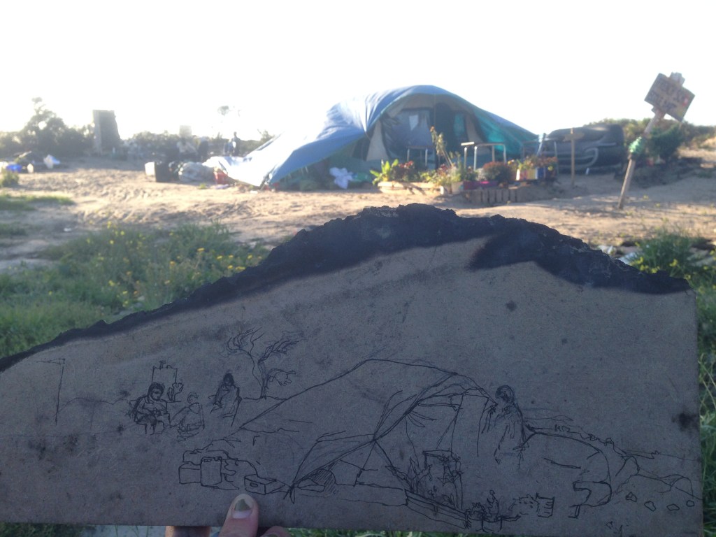 Sketching homes in the Calais Jungle on discarded material. A ghetto which has emerged in the shadow of the motorway, the border between Europe and the Uk. The product of sick politics which is driven by fear, but within it are examples of the best of humanity, support, generosity and resilience, as life must go on even in the most oppressive circumstances.